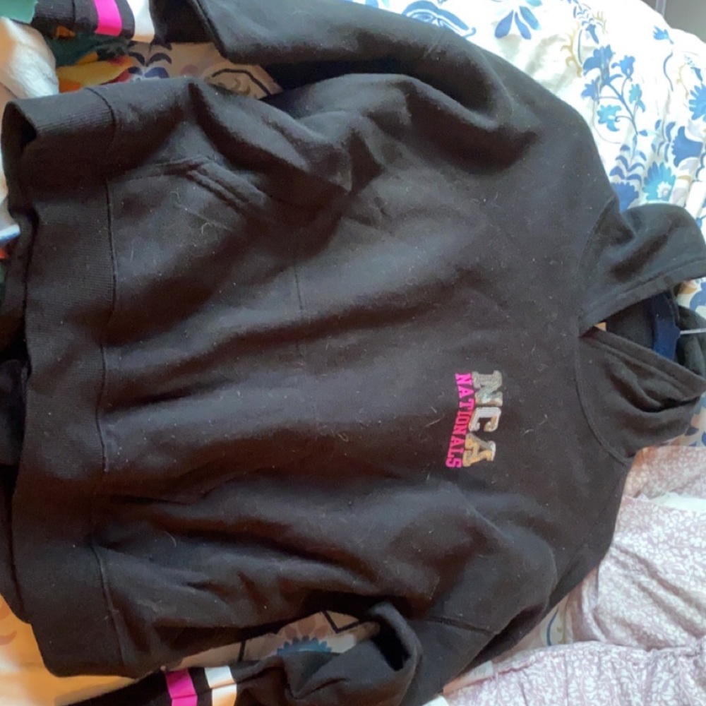 NCA cheer sweatshirt size: YL